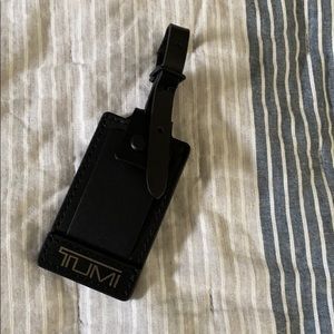 Small Tumi luggage tag!